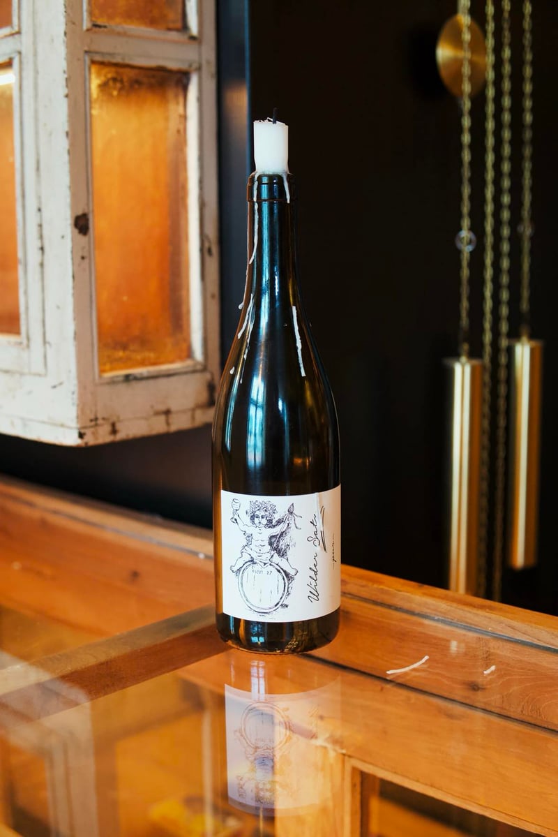 Wine bottle candle at Skreið