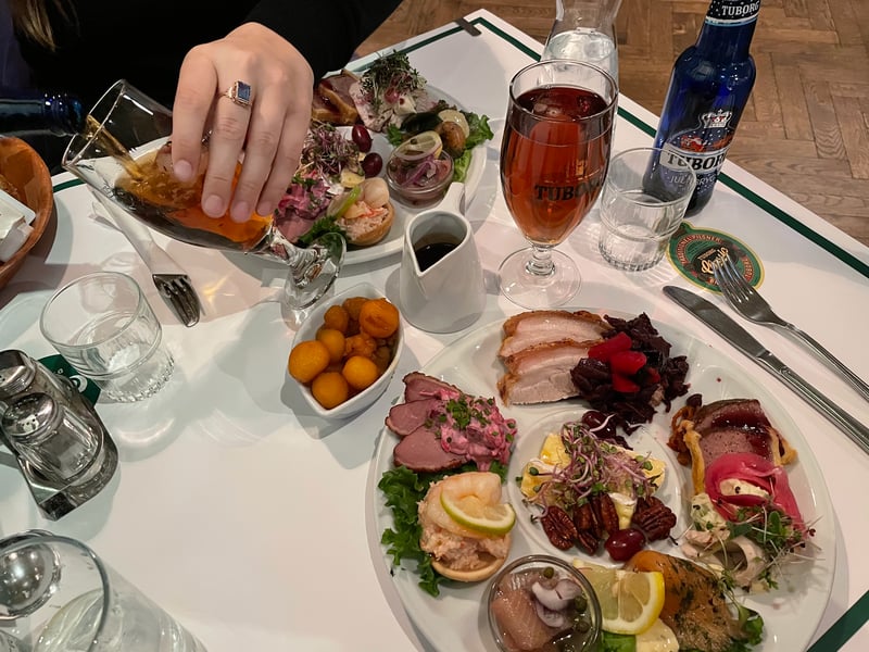 Christmas smørrebrød platter with beer and schnapps at Jómfrúin